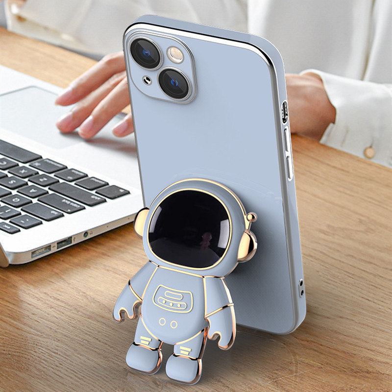 Coque iPhone dessin animé en TPU souple – Protection antichoc et design mignon (disponible en 6 couleurs) avec figurine d'astronaute.